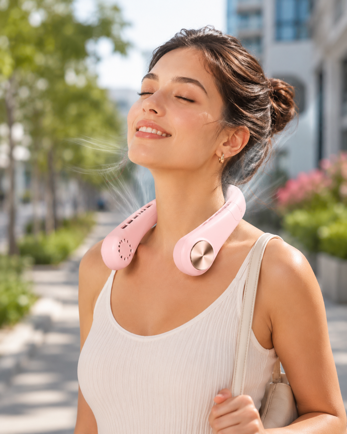 CoolFlow portable neck fan in pink, hands-free cooling for summer